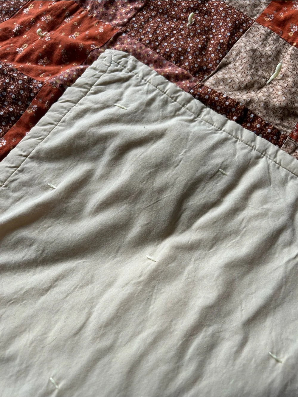Handmade vintage. Rust & Brown Floral Patchwork Quilt